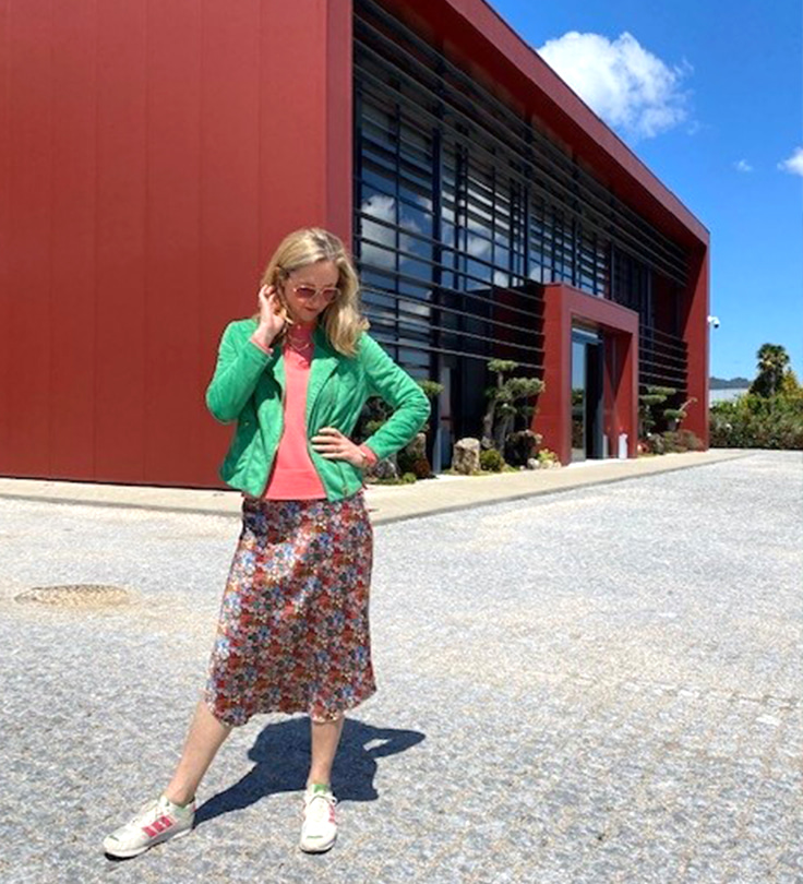 Melissa standing outside our textile's factory in Portugal