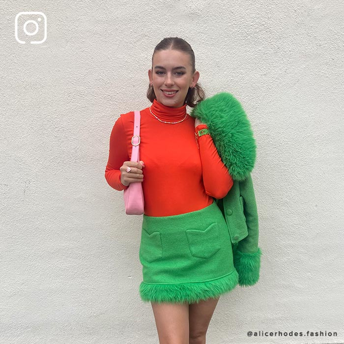 @alicerhodes.fashion wears the Silky Roll Neck in Persimmon